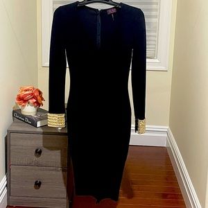 Black knee length dress, embellished wrist,